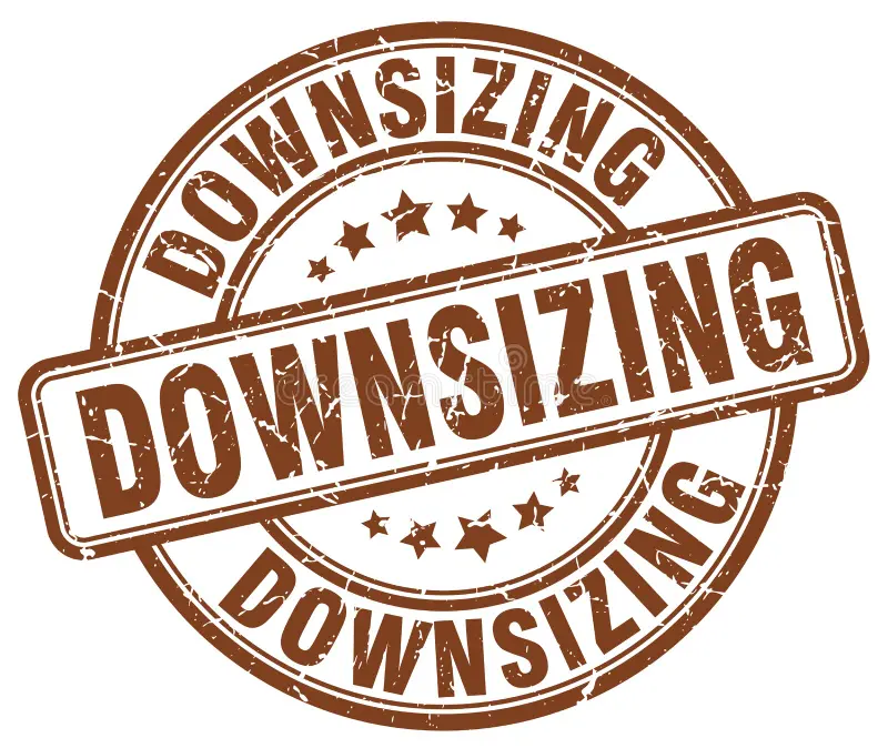 A rubber stamp reading DOWNSIZING — a metaphor for tech layoffs and AI replacing developers